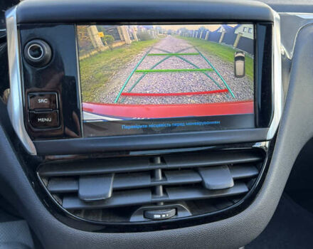 Помаранчевий Пежо 208, об'ємом двигуна 1.2 л та пробігом 125 тис. км за 8300 $, фото 29 на Automoto.ua