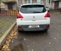 Белый Пежо 3008, объемом двигателя 2 л и пробегом 300 тыс. км за 9400 $, фото 2 на Automoto.ua