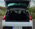 Белый Пежо 3008, объемом двигателя 2 л и пробегом 259 тыс. км за 10900 $, фото 1 на Automoto.ua