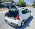 Білий Пежо 3008, об'ємом двигуна 2 л та пробігом 203 тис. км за 12000 $, фото 4 на Automoto.ua