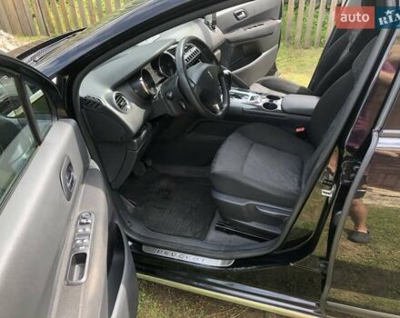 Черный Пежо 3008, объемом двигателя 2 л и пробегом 239 тыс. км за 10500 $, фото 13 на Automoto.ua