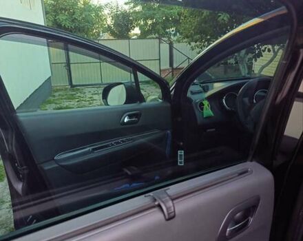 Черный Пежо 3008, объемом двигателя 2 л и пробегом 260 тыс. км за 10900 $, фото 41 на Automoto.ua