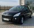 Черный Пежо 3008, объемом двигателя 1.6 л и пробегом 325 тыс. км за 8500 $, фото 1 на Automoto.ua