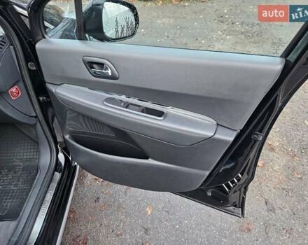 Черный Пежо 3008, объемом двигателя 2 л и пробегом 175 тыс. км за 10700 $, фото 18 на Automoto.ua