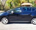 Чорний Пежо 3008, об'ємом двигуна 2 л та пробігом 263 тис. км за 10814 $, фото 1 на Automoto.ua