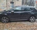 Черный Пежо 3008, объемом двигателя 1.56 л и пробегом 219 тыс. км за 12500 $, фото 1 на Automoto.ua