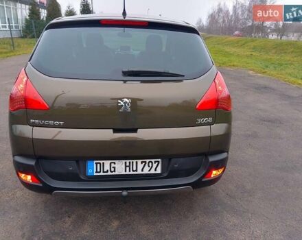Коричневый Пежо 3008, объемом двигателя 2 л и пробегом 260 тыс. км за 10700 $, фото 13 на Automoto.ua
