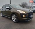 Коричневый Пежо 3008, объемом двигателя 2 л и пробегом 260 тыс. км за 10700 $, фото 1 на Automoto.ua