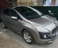 Серый Пежо 3008, объемом двигателя 1.6 л и пробегом 215 тыс. км за 5300 $, фото 1 на Automoto.ua
