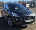 Серый Пежо 3008, объемом двигателя 1.6 л и пробегом 243 тыс. км за 9000 $, фото 1 на Automoto.ua