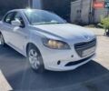 Білий Пежо 301, об'ємом двигуна 1.59 л та пробігом 245 тис. км за 5999 $, фото 1 на Automoto.ua