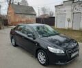 Чорний Пежо 301, об'ємом двигуна 1.2 л та пробігом 101 тис. км за 5900 $, фото 1 на Automoto.ua