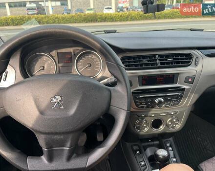 Черный Пежо 301, объемом двигателя 1.59 л и пробегом 125 тыс. км за 8700 $, фото 1 на Automoto.ua