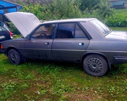 Серый Пежо 305, объемом двигателя 1.6 л и пробегом 100 тыс. км за 900 $, фото 1 на Automoto.ua