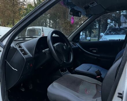 Білий Пежо 306, об'ємом двигуна 1.4 л та пробігом 320 тис. км за 1650 $, фото 5 на Automoto.ua