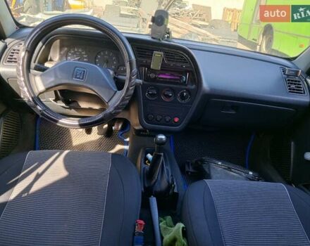 Белый Пежо 306, объемом двигателя 1.4 л и пробегом 300 тыс. км за 800 $, фото 5 на Automoto.ua