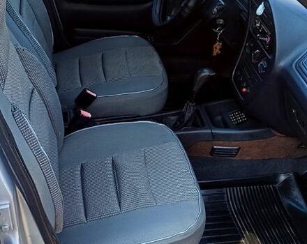 Серый Пежо 306, объемом двигателя 14 л и пробегом 411 тыс. км за 1799 $, фото 8 на Automoto.ua