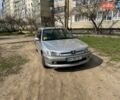 Сірий Пежо 306, об'ємом двигуна 1.36 л та пробігом 299 тис. км за 3800 $, фото 1 на Automoto.ua