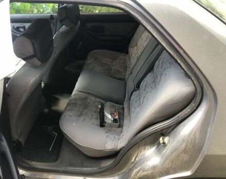 Серый Пежо 306, объемом двигателя 1.6 л и пробегом 260 тыс. км за 700 $, фото 1 на Automoto.ua