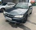 Синий Пежо 306, объемом двигателя 1.4 л и пробегом 250 тыс. км за 950 $, фото 1 на Automoto.ua