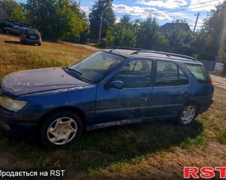 Синий Пежо 306, объемом двигателя 1.6 л и пробегом 200 тыс. км за 1500 $, фото 1 на Automoto.ua