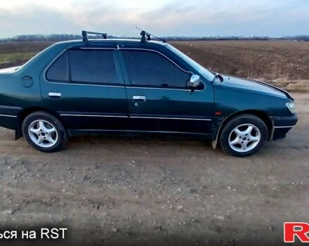 Зеленый Пежо 306, объемом двигателя 1.4 л и пробегом 374 тыс. км за 1200 $, фото 5 на Automoto.ua