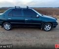 Зеленый Пежо 306, объемом двигателя 1.4 л и пробегом 374 тыс. км за 1200 $, фото 5 на Automoto.ua