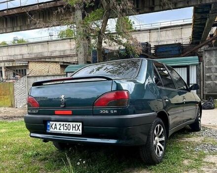 Зеленый Пежо 306, объемом двигателя 1.4 л и пробегом 300 тыс. км за 2300 $, фото 1 на Automoto.ua
