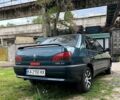Зеленый Пежо 306, объемом двигателя 1.4 л и пробегом 300 тыс. км за 2300 $, фото 1 на Automoto.ua