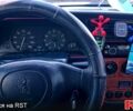 Зеленый Пежо 306, объемом двигателя 1.4 л и пробегом 374 тыс. км за 1200 $, фото 4 на Automoto.ua