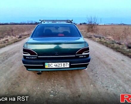 Зеленый Пежо 306, объемом двигателя 1.4 л и пробегом 374 тыс. км за 1200 $, фото 1 на Automoto.ua