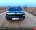 Зеленый Пежо 306, объемом двигателя 1.4 л и пробегом 374 тыс. км за 1200 $, фото 1 на Automoto.ua