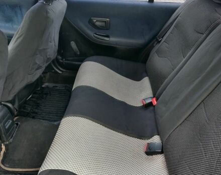 Зеленый Пежо 306, объемом двигателя 1.4 л и пробегом 457 тыс. км за 1700 $, фото 3 на Automoto.ua