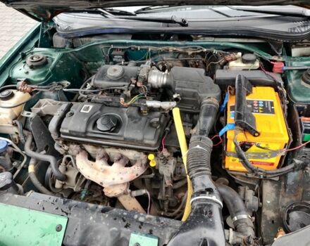 Зеленый Пежо 306, объемом двигателя 1.4 л и пробегом 457 тыс. км за 1700 $, фото 1 на Automoto.ua