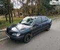 Зеленый Пежо 306, объемом двигателя 1.4 л и пробегом 252 тыс. км за 1750 $, фото 1 на Automoto.ua