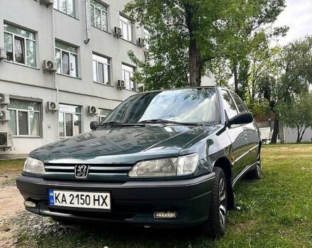 Зеленый Пежо 306, объемом двигателя 1.4 л и пробегом 300 тыс. км за 2300 $, фото 1 на Automoto.ua
