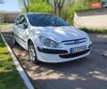 Белый Пежо 307, объемом двигателя 2 л и пробегом 350 тыс. км за 2999 $, фото 1 на Automoto.ua