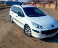 Белый Пежо 307, объемом двигателя 1.4 л и пробегом 166 тыс. км за 4300 $, фото 1 на Automoto.ua