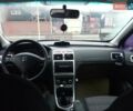 Білий Пежо 307, об'ємом двигуна 1.59 л та пробігом 370 тис. км за 3300 $, фото 9 на Automoto.ua