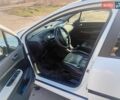 Белый Пежо 307, объемом двигателя 1.4 л и пробегом 166 тыс. км за 4300 $, фото 1 на Automoto.ua
