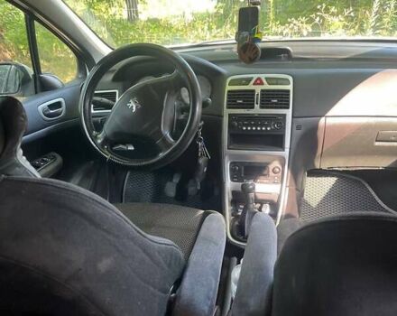 Белый Пежо 307, объемом двигателя 1.59 л и пробегом 600 тыс. км за 4500 $, фото 3 на Automoto.ua