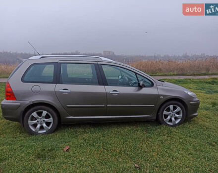 Бежевый Пежо 307, объемом двигателя 2 л и пробегом 86 тыс. км за 4850 $, фото 1 на Automoto.ua