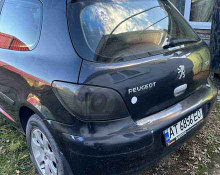 Черный Пежо 307, объемом двигателя 1.59 л и пробегом 280 тыс. км за 1000 $, фото 2 на Automoto.ua