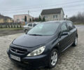 Черный Пежо 307, объемом двигателя 1.4 л и пробегом 300 тыс. км за 2500 $, фото 1 на Automoto.ua