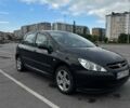Черный Пежо 307, объемом двигателя 1.59 л и пробегом 280 тыс. км за 4100 $, фото 1 на Automoto.ua