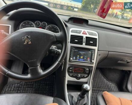 Черный Пежо 307, объемом двигателя 1.59 л и пробегом 280 тыс. км за 4100 $, фото 6 на Automoto.ua
