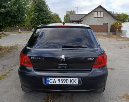 Черный Пежо 307, объемом двигателя 1.6 л и пробегом 380 тыс. км за 4500 $, фото 4 на Automoto.ua