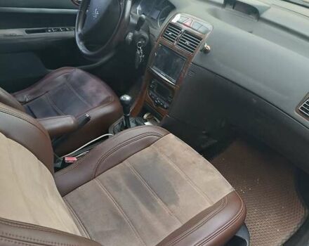 Черный Пежо 307, объемом двигателя 1.99 л и пробегом 320 тыс. км за 2300 $, фото 3 на Automoto.ua