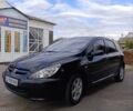 Черный Пежо 307, объемом двигателя 1.59 л и пробегом 380 тыс. км за 4500 $, фото 1 на Automoto.ua