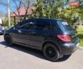 Черный Пежо 307, объемом двигателя 2 л и пробегом 160 тыс. км за 4000 $, фото 1 на Automoto.ua
